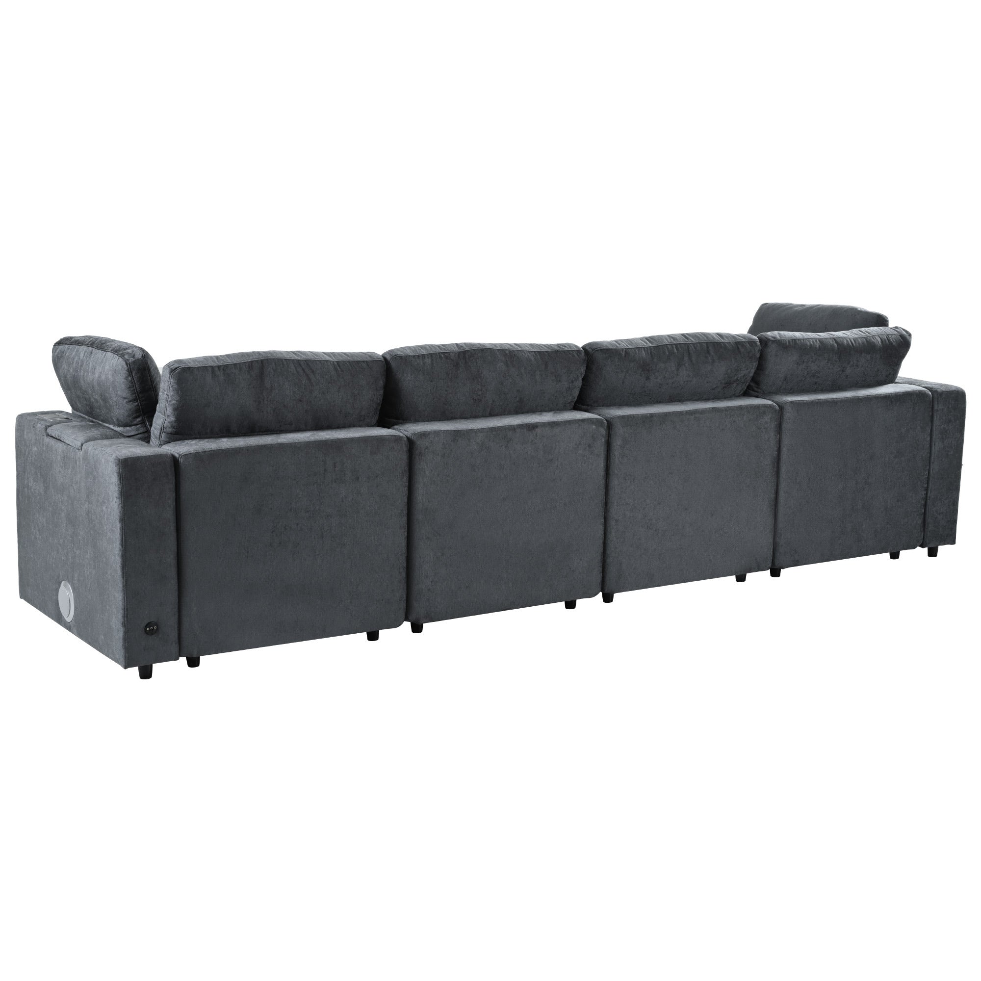 Rear view of modular sofa with hidden storage and charging ports, showcasing modular sections and tech integration.