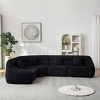 Modern Black Modular Sofa in chenille fabric, 4-seater with curved backrest and plush cushions, styled in a contemporary living room.