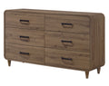 Contemporary light brown wooden six-drawer dresser with rounded corners and slim black metal handles on tapered legs.