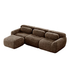 Chocolate plush modular sofa with three seats and movable ottoman, designed for flexible living room arrangements and comfort.