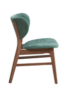 Side profile of green upholstered dining chair with walnut legs, designed for comfort and elegance in the walnut dining set.