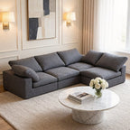 Oversized grey chenille 3-seater sectional sofa with deep, plush cushions in a modern, elegant living room.