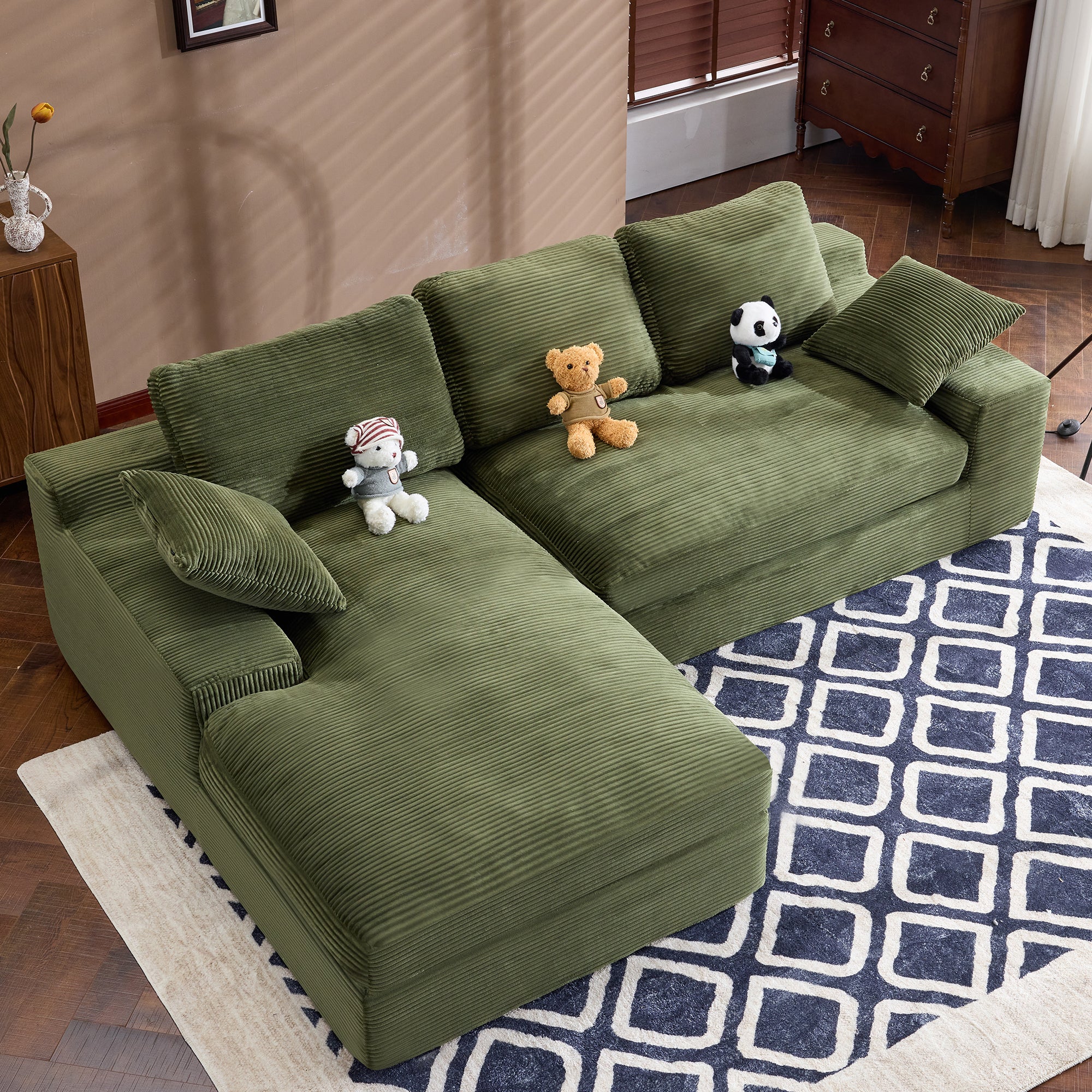 Modern Green Corduroy Sofa with plush cushions and pillows, 4-seat layout ideal for spacious living rooms and family lounging.