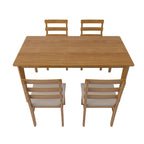 Top view of Solid Wood Dining Table Set with 4 ergonomic chairs, showcasing durable wood construction and spacious tabletop.