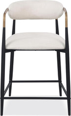 Front view of a contemporary counter height chair with black metal legs, gold arm accents, and a cushioned beige seat and backrest.