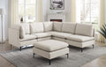 Beige linen modular sectional sofa with matching ottoman and sleek black metal legs in a bright living room.