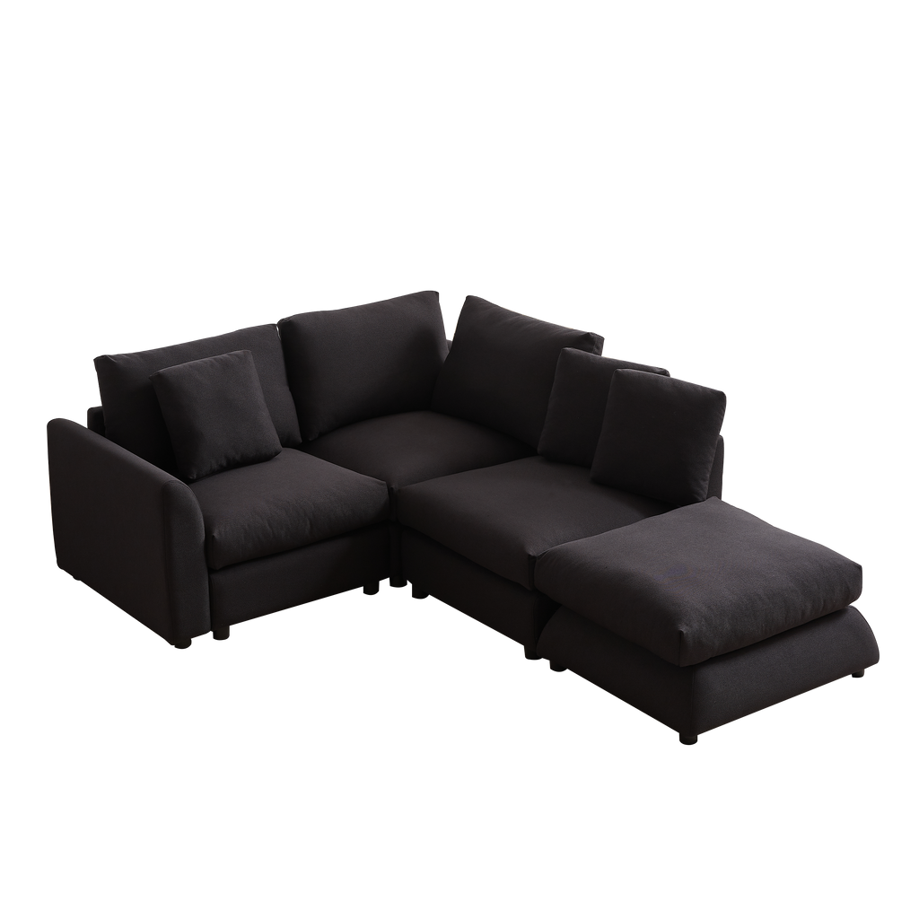 Corner view of L-shaped modular sofa sleeper with ottoman, featuring 3 cushions and 4 pillows in dark fabric for stylish and functional seating.