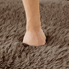 Hand pressing into plush surface of Modular Sofa, illustrating the high-density sponge and soft fabric for luxurious seating experience.