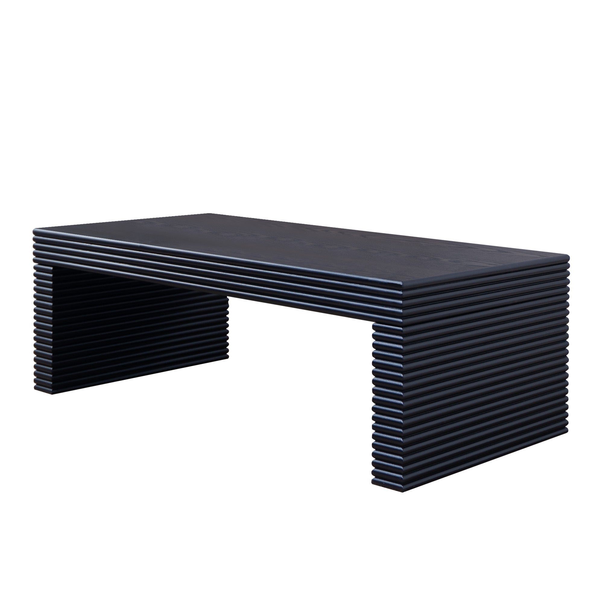 Angled side view of modern black ribbed coffee table highlighting its low profile and engineered wood construction.