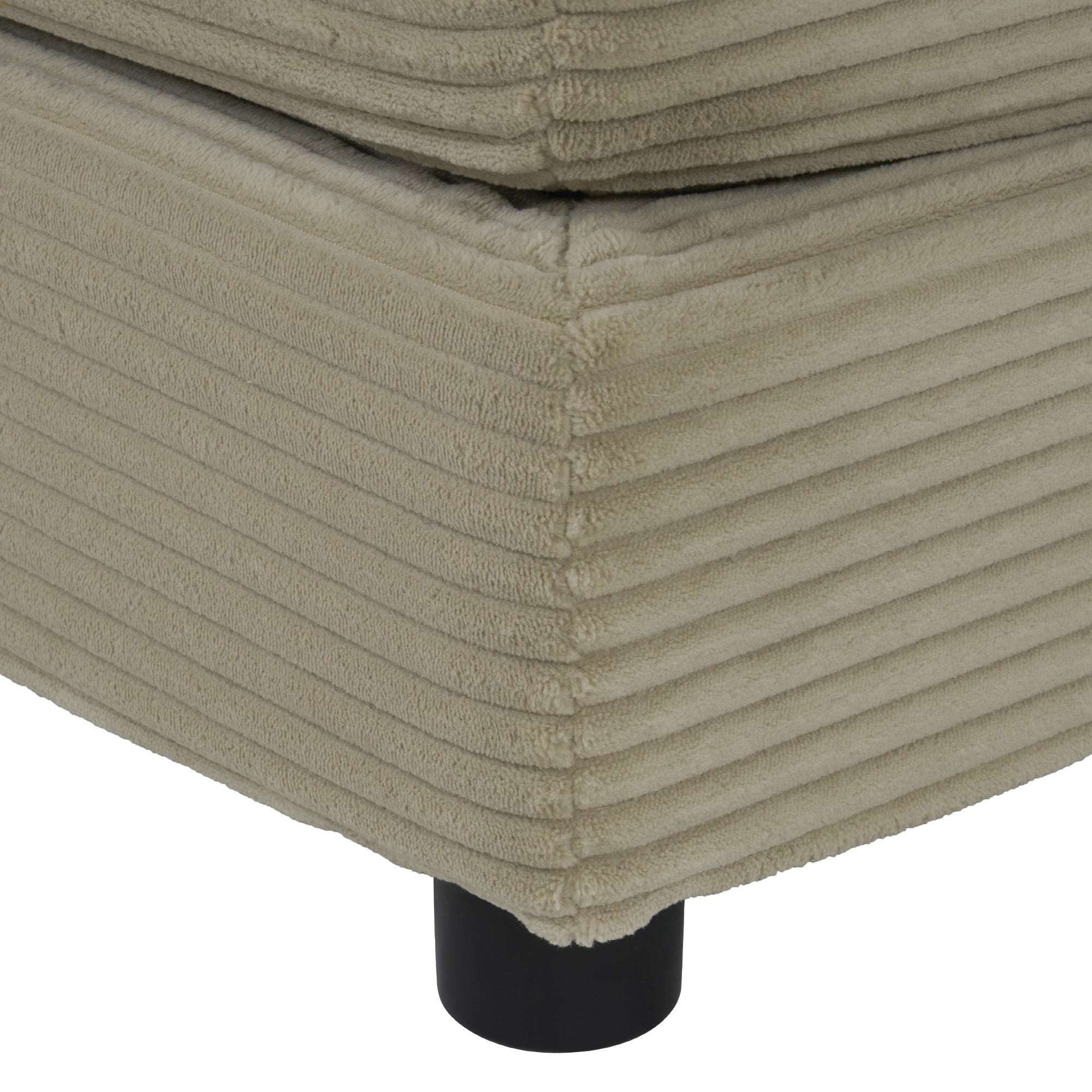 Brown Corduroy Modular Sofa - Adjustable Pillows | Durable close-up of sofa base corner with ribbed upholstery and black cylindrical leg.
