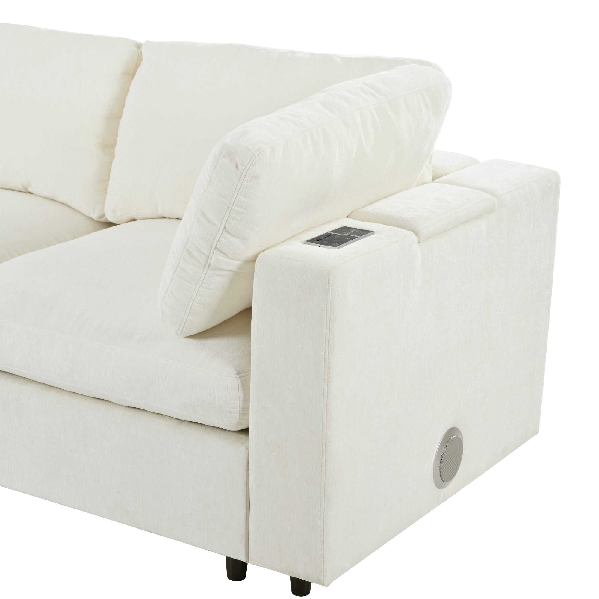 Close-up of Modular Sofa armrest with wireless charging pad and USB ports, upholstered in soft chenille fabric.