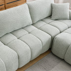 Top view of modular sectional sofa with ottoman showing plush seating and cushion arrangement for maximum comfort.