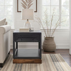 Modern Nora 22 Inch End Table with black body and whiskey base, styled in cozy living room with natural light and neutral decor.