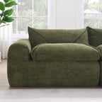 Detail of single seat on 116'' compressed sofa in green, emphasizing plush high density foam and soft, durable upholstery.