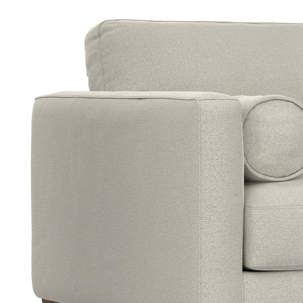 Close-up of left armrest and cushion on Modern Armchair Cream White - Morrison Collection, highlighting soft padding and stitching.