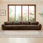 Front view of modular chocolate plush sofa with four seats, showcasing its cozy, seamless design and plush fabric for home interiors.