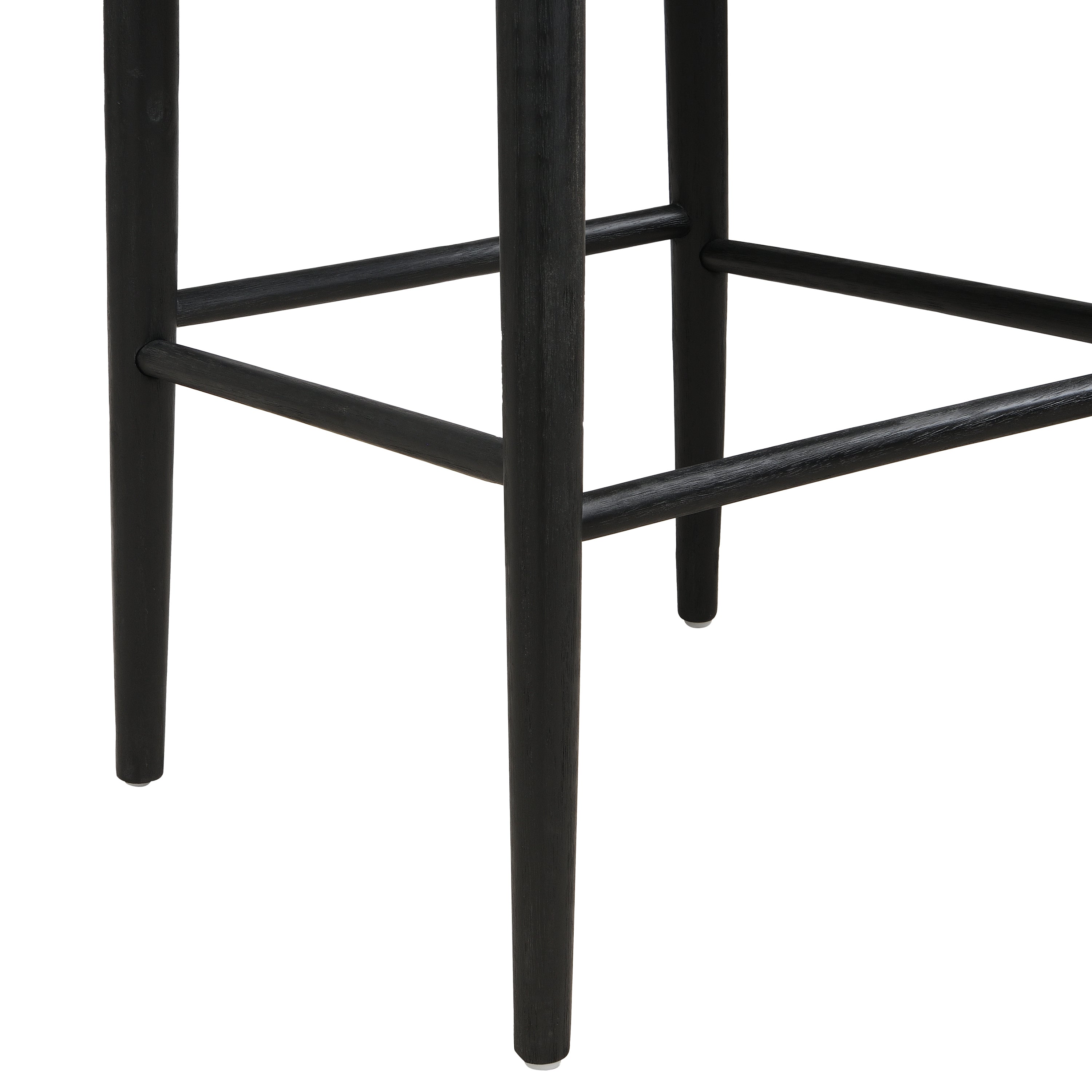 Close-up of black bar stool legs and footrest, highlighting sturdy rubberwood construction and sleek tapered design.