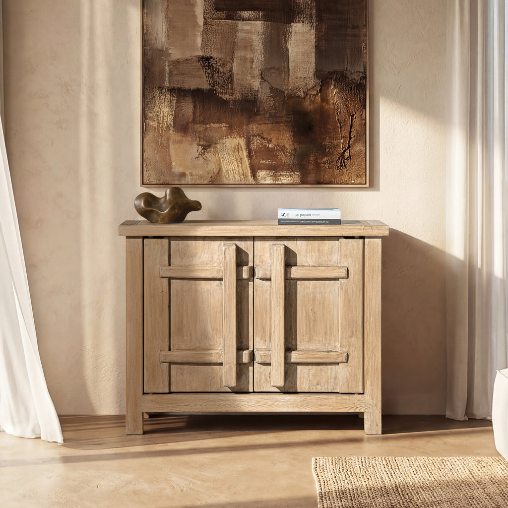 Light natural brown reclaimed pine storage cabinet with two doors featuring a distinctive vertical crossbar design.