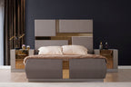Lorenzo Queen Bed styled in a luxury bedroom setup with matching nightstands, gray frame and gold-accented headboard.