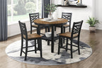 Modern dining room setup with 5pc counter height dining set featuring round table with storage and four chairs in black and wood.