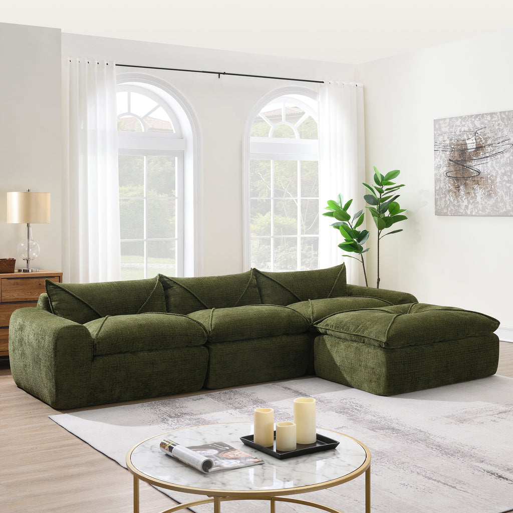 Green 116'' compressed sofa with high density foam in a sunlit room, showcasing its plush seating and no assembly convenience.