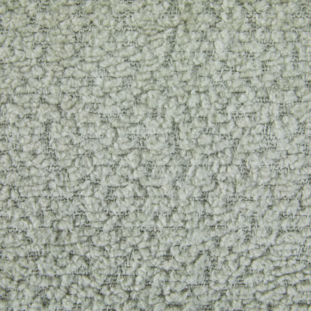 Close-up texture of boucle fabric used on 360 swivel recliner chair, highlighting soft and durable material quality.
