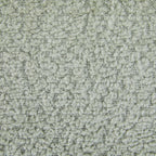 Close-up texture of boucle fabric used on 360 swivel recliner chair, highlighting soft and durable material quality.