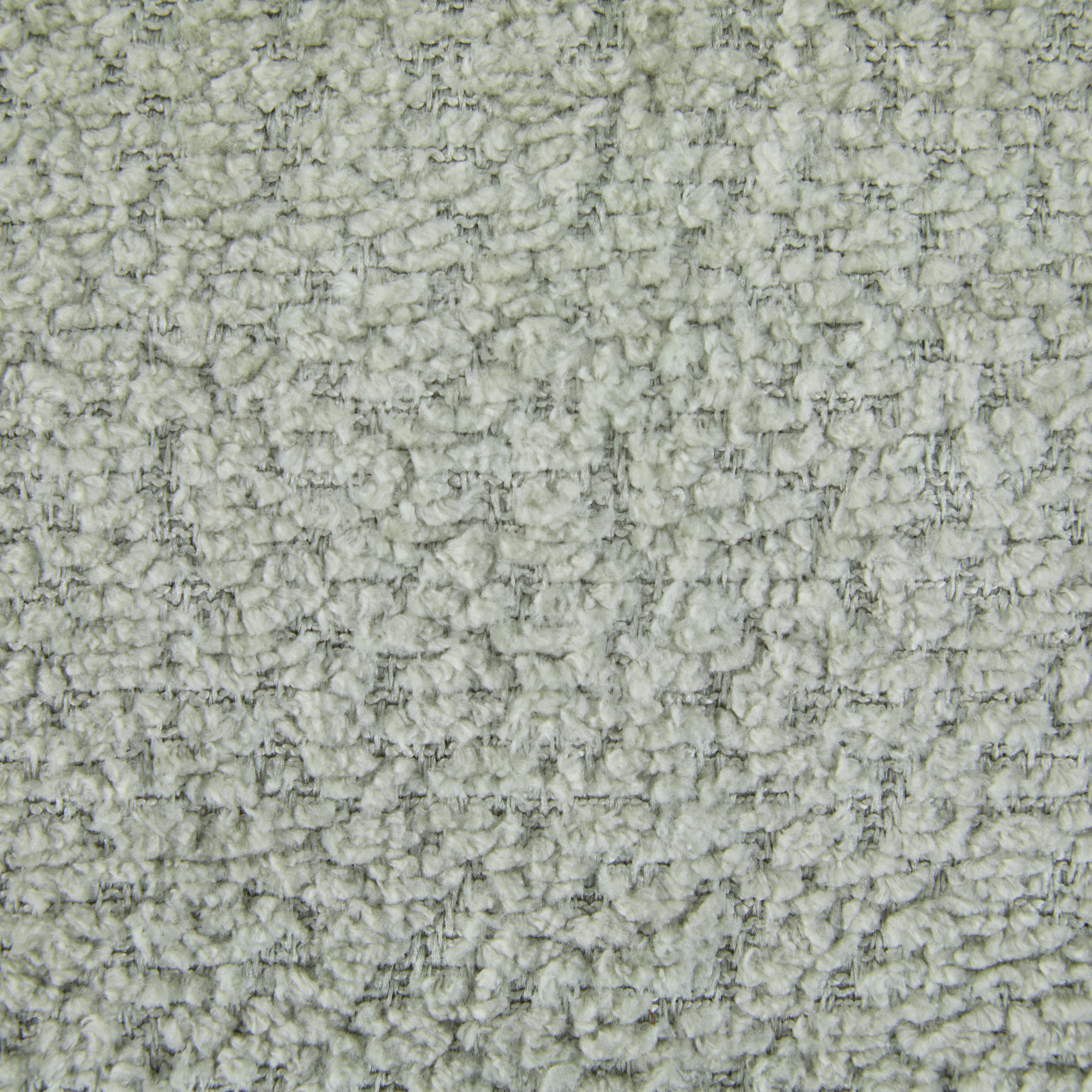 Close-up texture of boucle fabric used on 360 swivel recliner chair, highlighting soft and durable material quality.