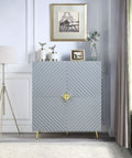 Modern gray high-gloss storage cabinet with a textured chevron pattern, gold star-shaped hardware, and slim gold legs.
