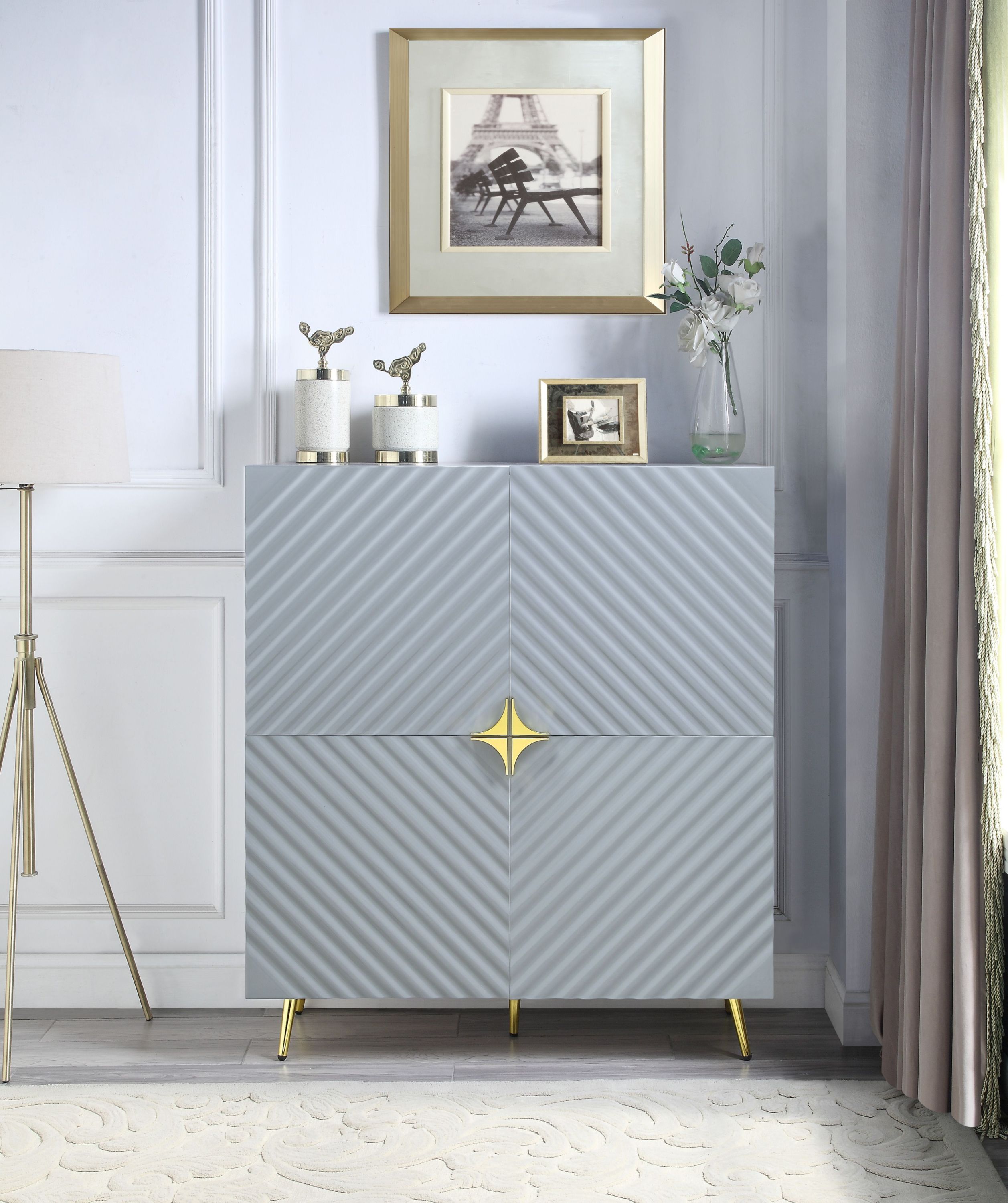 Modern gray high-gloss storage cabinet with a textured chevron pattern, gold star-shaped hardware, and slim gold legs.