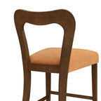 Detail of backrest and seat on Walnut Caramel Counter Stool. Features a contoured wood frame and soft caramel cushion.