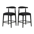Black Fabric Counter Stool Set of 2 with sleek curved backrests and cushioned seats, perfect for stylish and comfy kitchen or bar seating.