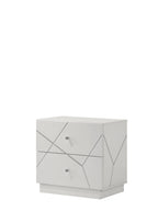 Modern white high-gloss nightstand with two drawers, geometric silver line accents, and sleek silver knobs.