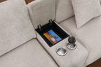 Storage compartment with tablet and cupholders on beige chenille sectional sofa, highlighting functional design features.