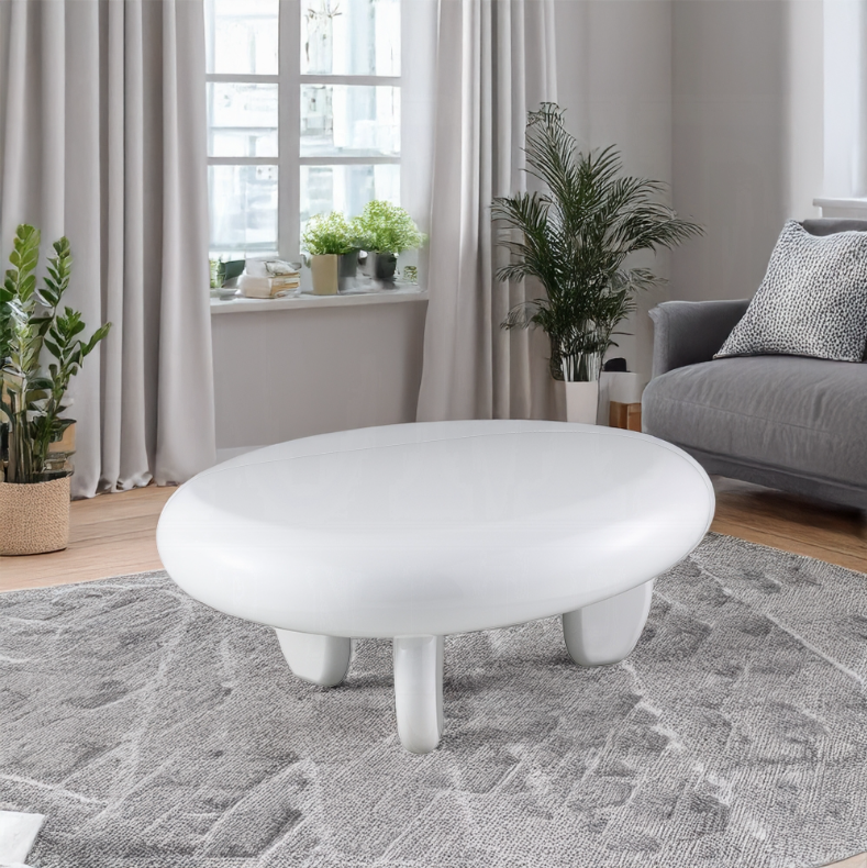 Gloss White Coffee Table - Wylie High Gloss design in modern living room with gray sofa and indoor plants, ideal for contemporary interiors.
