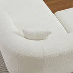 Top-down view of the armrest and cushion on the beige chenille modular sectional sofa, showing its soft and supportive design.