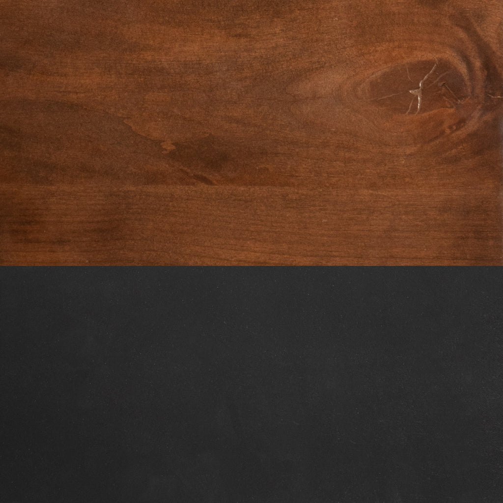 Detail of Nora 22 Inch End Table's whiskey wood base and black finish, showcasing contrast in modern furniture design.