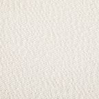 Modish Round Ottoman with Boucle Top and Natural Wood Legs.
