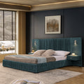 Blue-green king-size platform bed featuring pleated chenille upholstery, integrated headboard, and attached nightstands.