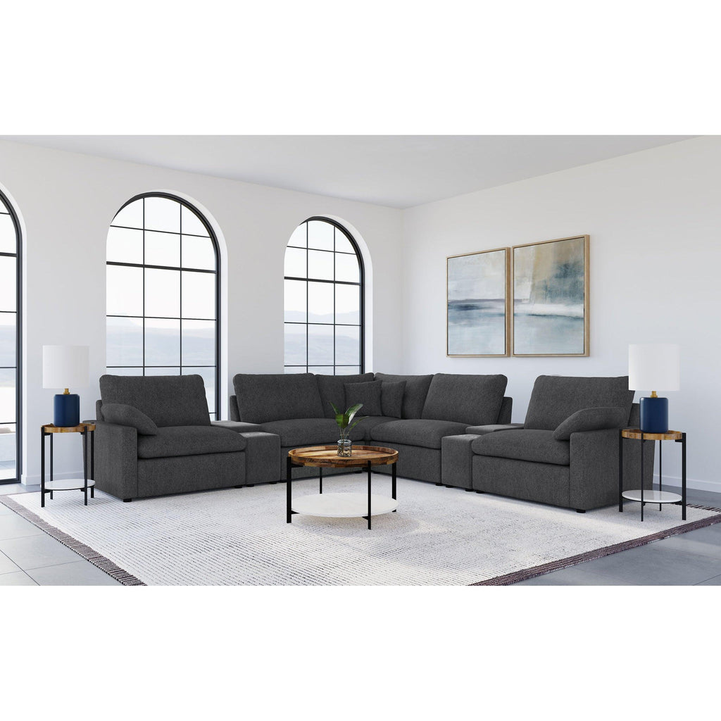 Modular Power Reclining Sectional in Dark Grey Fabric.