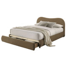 Angled view of queen size bed frame with curved velvet headboard and open storage drawer. Upholstered wood frame suits modern homes.