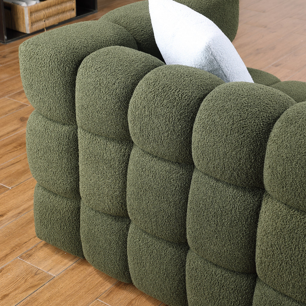Detail of Olive Green Boucle Sofa - 3 Seater, Marshmallow Cozy armrest with textured boucle fabric and plush padding.