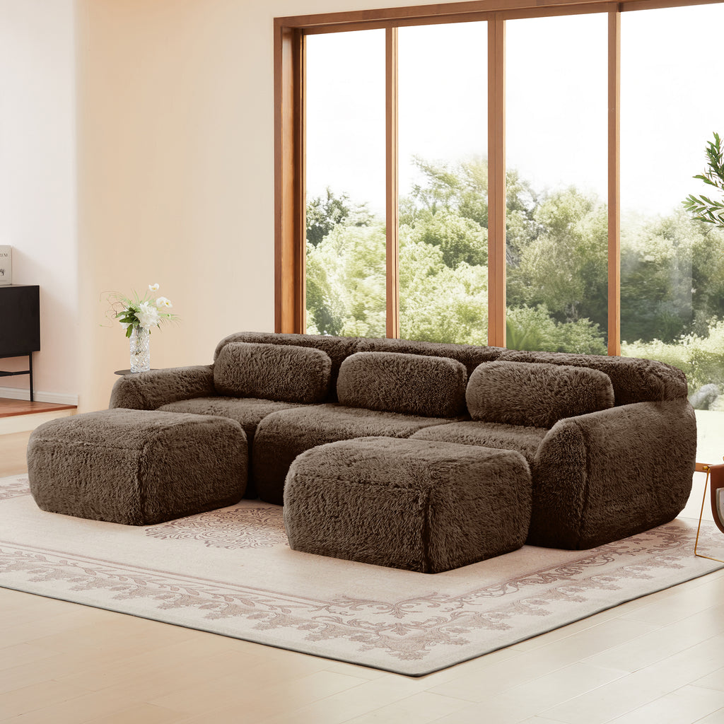 Angled view of modular U-shaped sofa in chocolate plush fabric, featuring ergonomic design and spacious seating for three.