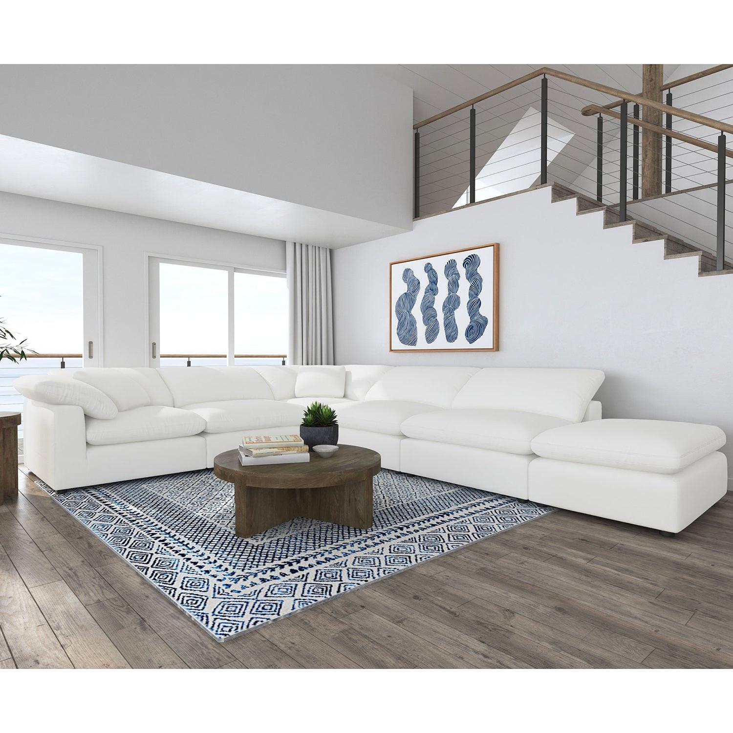 Segoura Ivory Upholstered Modular Sectional with Ottoman.