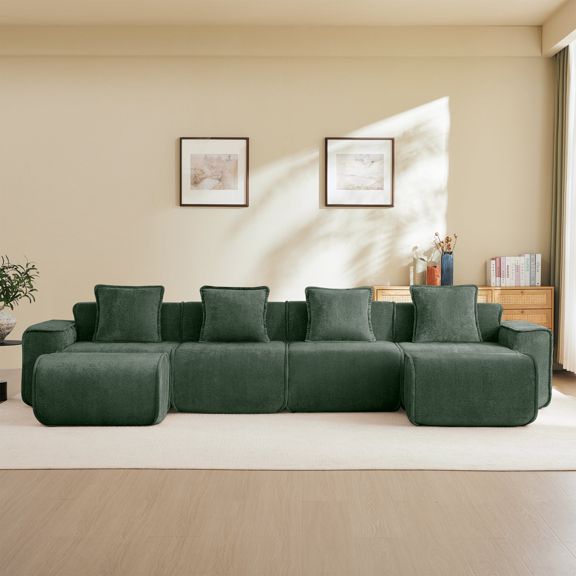 Modular Green Sofa with 4 velvet seats and five matching throw pillows, offering comfort and style for contemporary home decor.