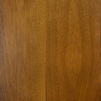 Close-up of solid wood tabletop texture in natural finish. Highlights the durable and elegant grain pattern of the dining table surface.