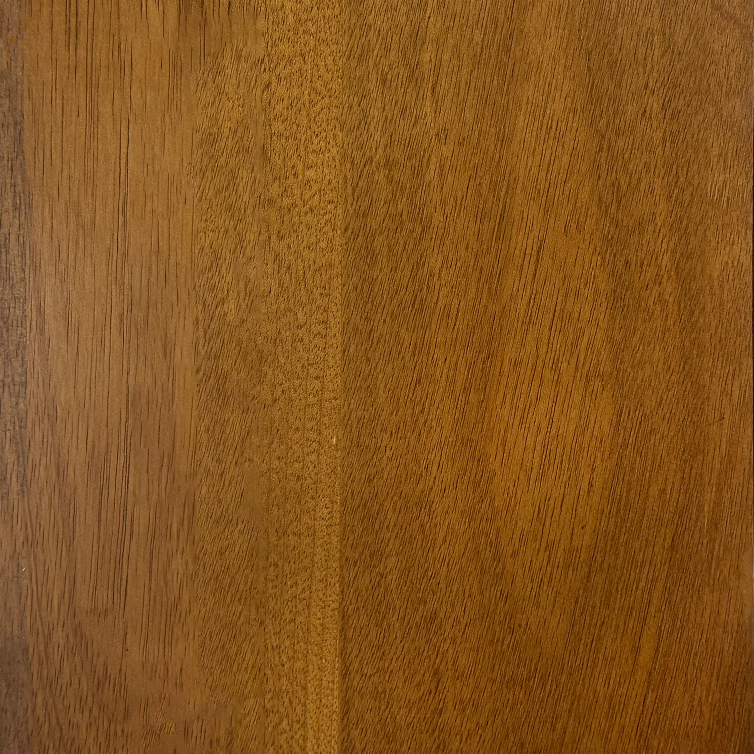 Close-up of solid wood tabletop texture in natural finish. Highlights the durable and elegant grain pattern of the dining table surface.