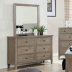 Transitional Gray Dresser with Round Pull Knobs.