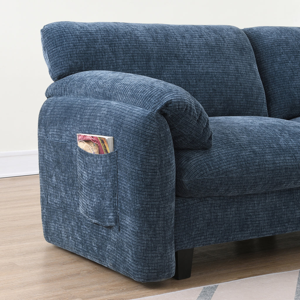 Side pocket on modular sofa armrest for storing magazines or remotes, blending convenience with modern design.