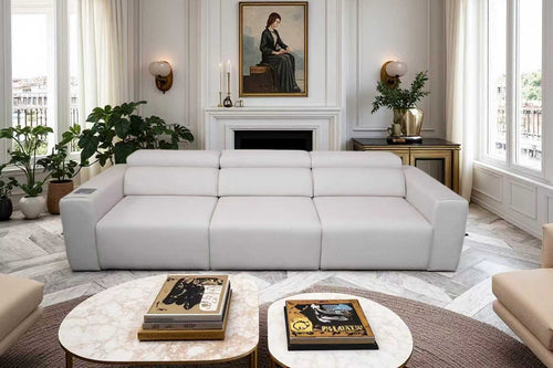 Light grey 3-seat modular power reclining sofa with integrated wireless charging and speakers in a modern living room.